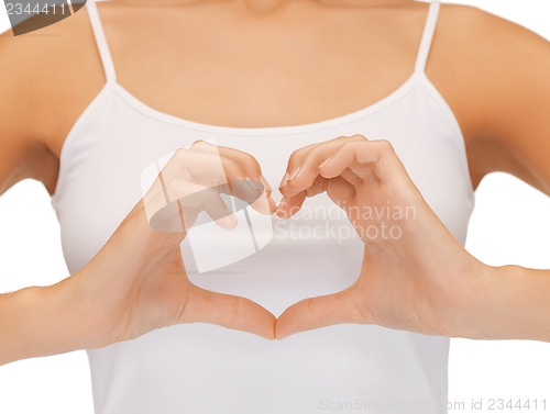 Image of woman's hands showing heart shape