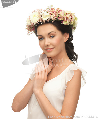 Image of woman wearing wreath of flowers