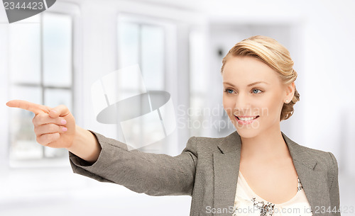 Image of businesswoman pointing her finger