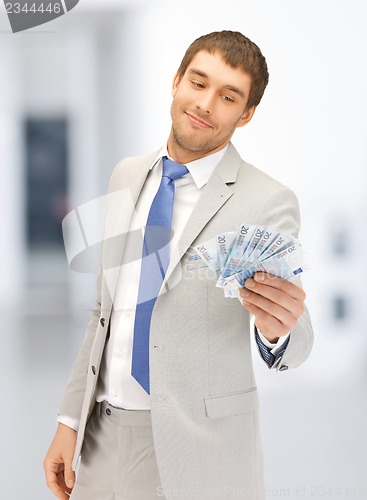 Image of man with euro cash money