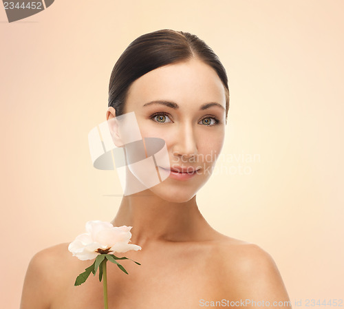 Image of picture of smiling woman with rose