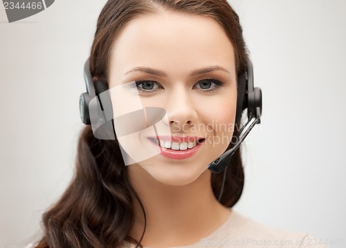 Image of friendly female helpline operator