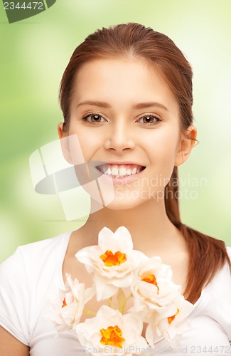 Image of beautiful woman with white flower