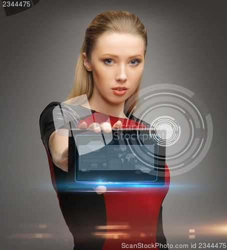 Image of futuristic woman with tablet pc