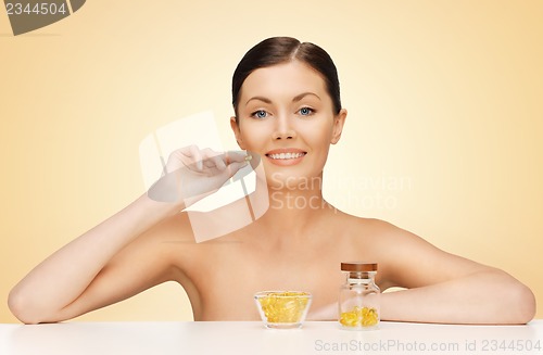 Image of woman with vitamins