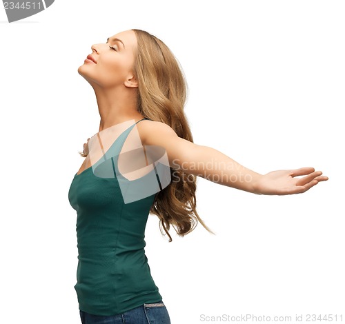 Image of woman spreading hands