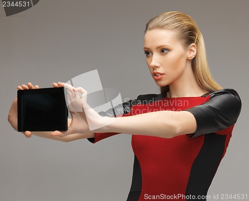 Image of futuristic woman with tablet pc