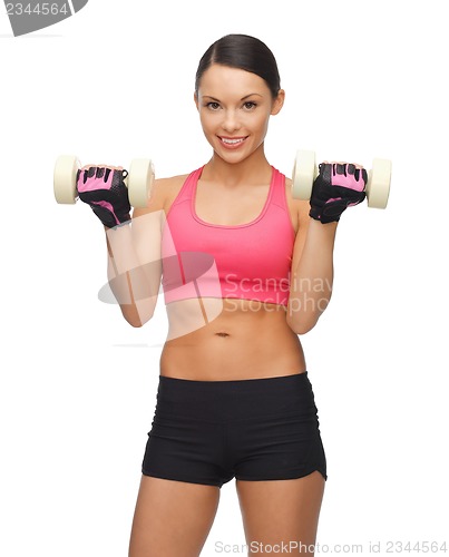 Image of woman with dumbbells