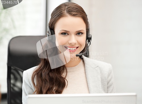 Image of friendly female helpline operator