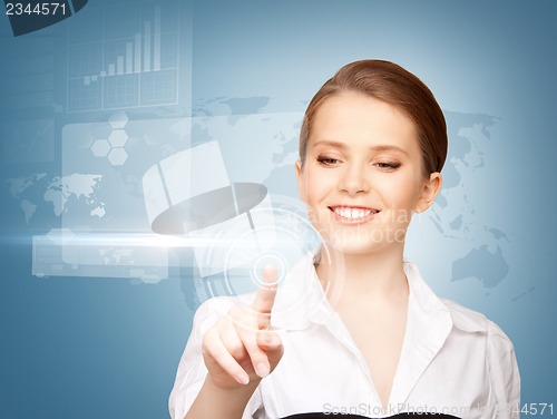 Image of businesswoman touching virtual screen