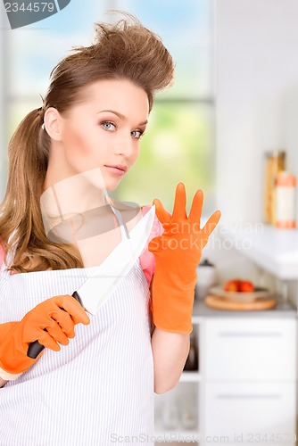 Image of housewife with big knife