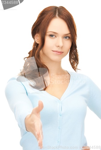 Image of woman with an open hand ready for handshake