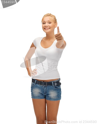 Image of teenage girl in blank white t-shirt with thumbs up