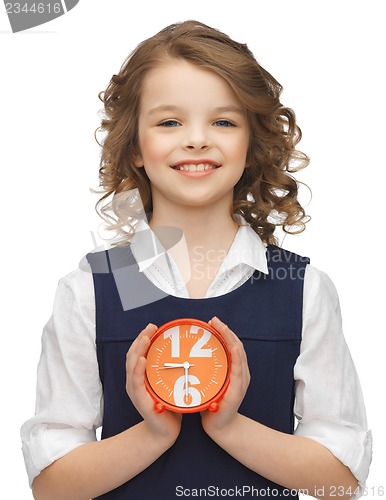 Image of girl with alarm clock