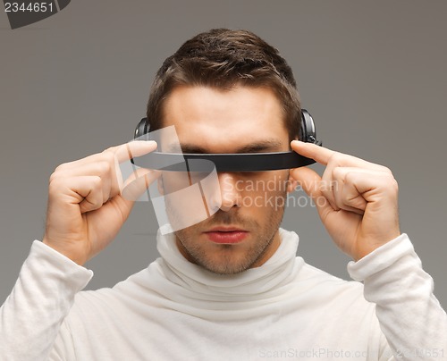 Image of man with futuristic glasses