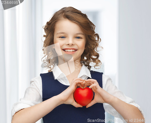 Image of girl with small heart