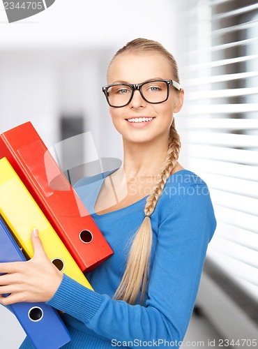 Image of businesswoman with folders