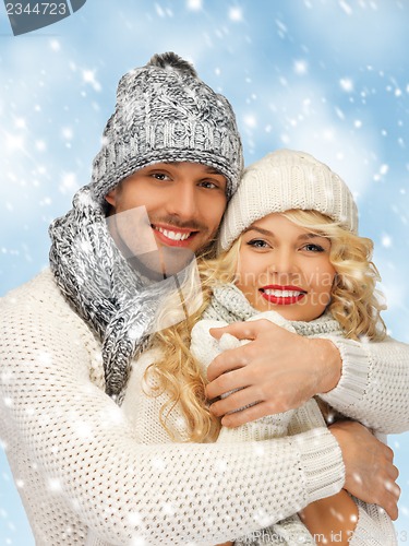 Image of family couple in a winter clothes