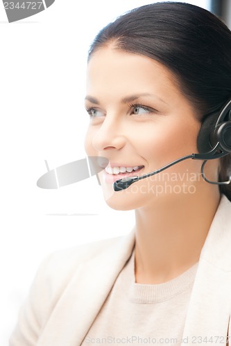 Image of friendly female helpline operator