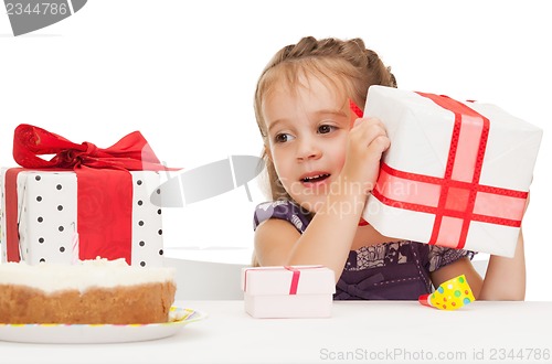 Image of litle girl with birthday cake