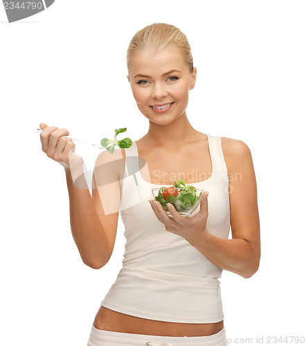 Image of healthy woman holding bowl with salad