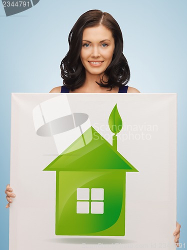 Image of woman with illustration of green eco house