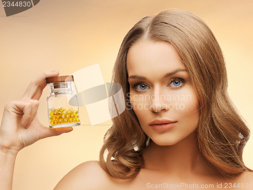 Image of woman with vitamins