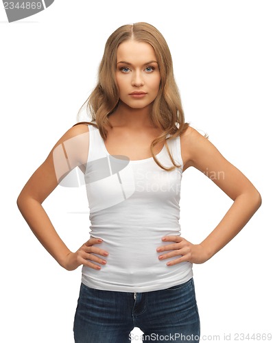 Image of calm and serious woman in blank white t-shirt