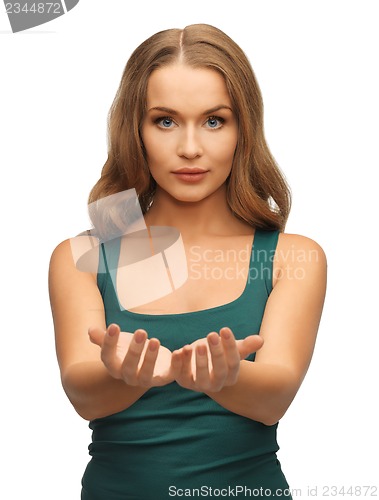 Image of woman holding something on the palms