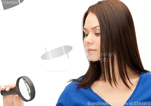 Image of woman with magnifying glass