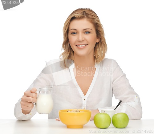 Image of woman with healthy breakfast