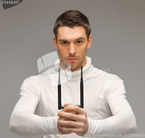 Image of futuristic man with gadget