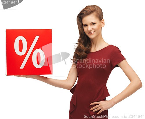 Image of teenage girl in red dress with sale sign