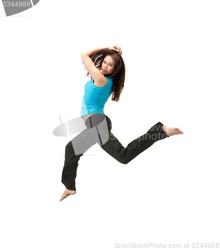 Image of sporty woman jumping in sportswear