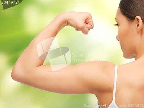 Image of sporty woman flexing her biceps