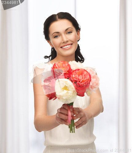Image of woman with bouquet of flowers