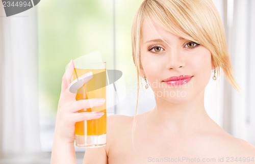 Image of girl with a glass of juice