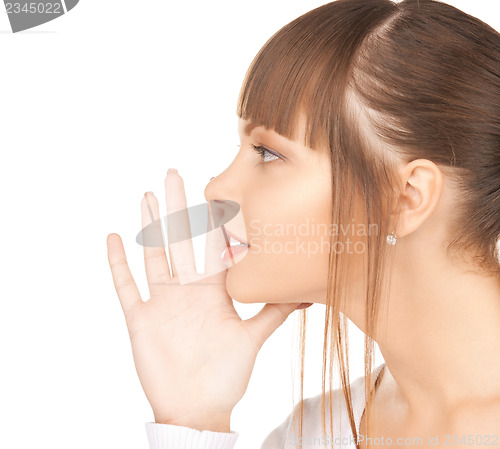 Image of woman whispering gossip