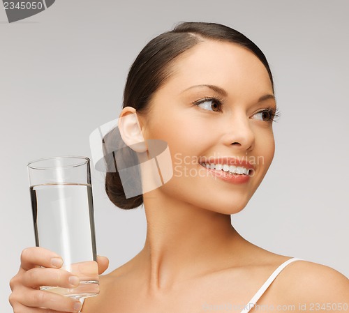 Image of woman with glass of water