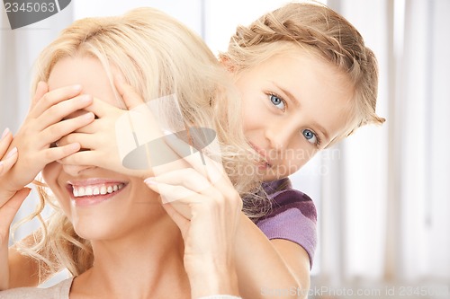 Image of happy mother and little girl