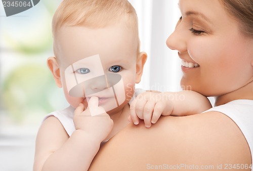 Image of happy mother with adorable baby
