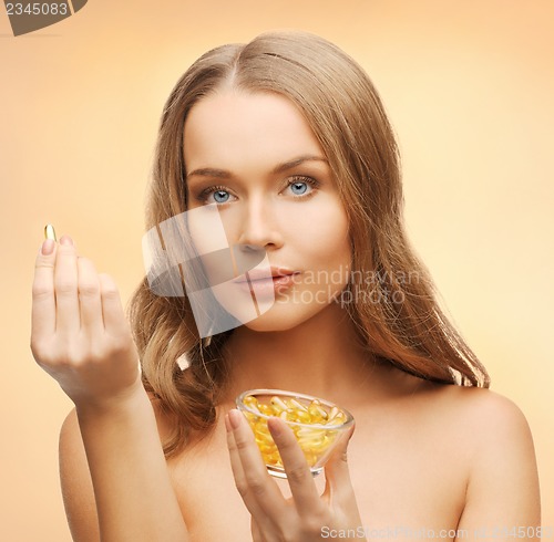 Image of woman with vitamins