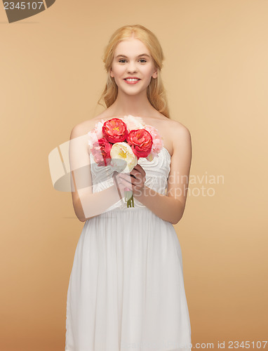 Image of woman with bouquet of flowers