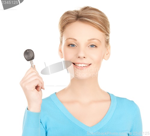Image of happy woman with car key