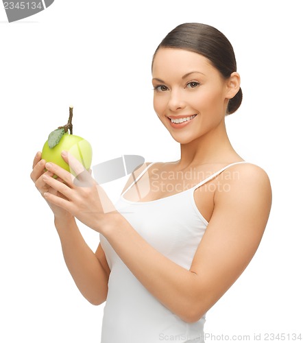 Image of woman with green apple