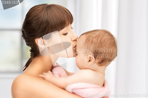 Image of happy mother with adorable baby