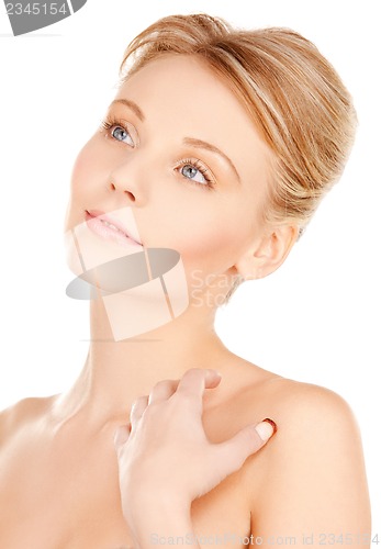 Image of face and hands of beautiful woman