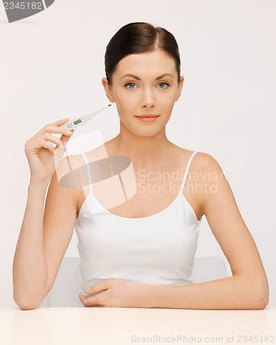 Image of woman with thermometer