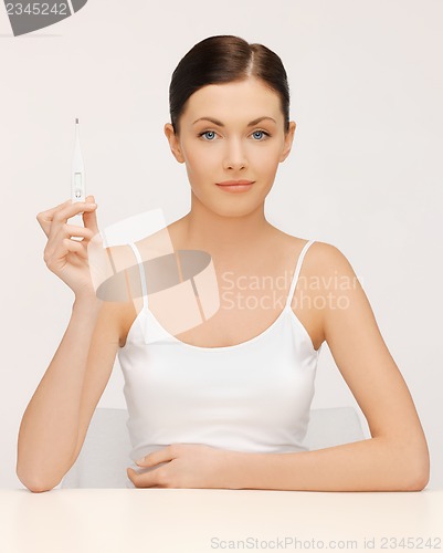 Image of woman with thermometer