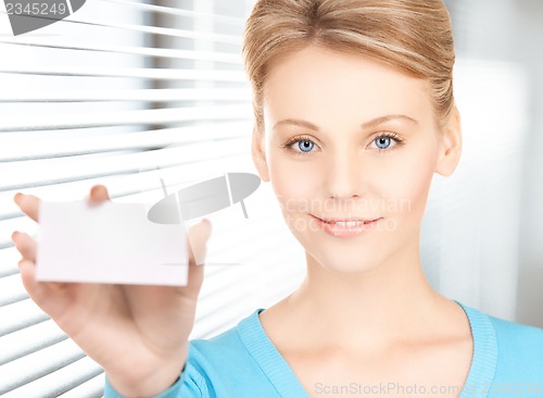 Image of woman with blank business or name card